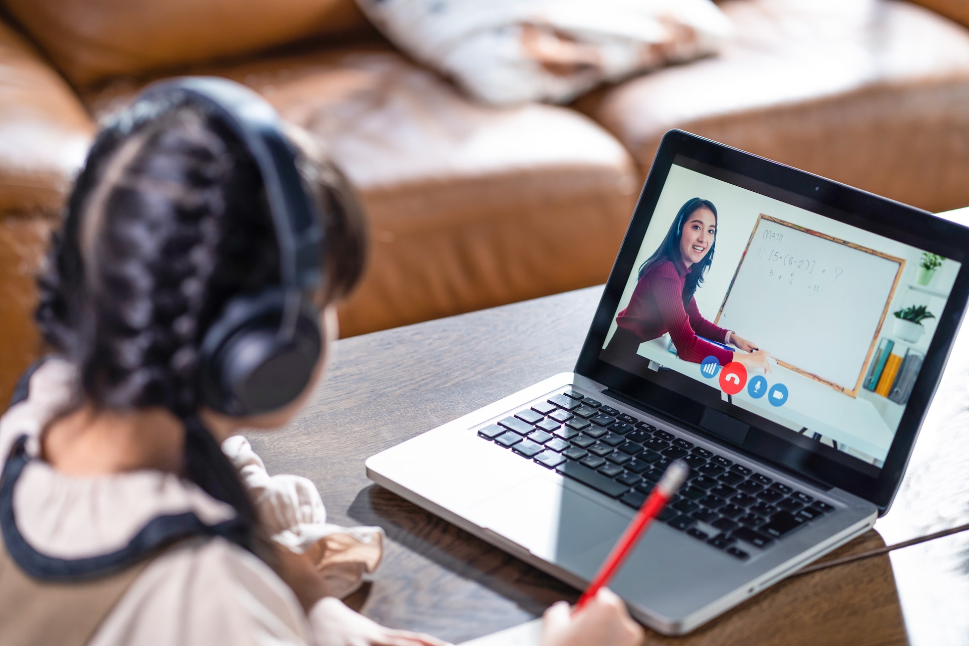 homeschool-asian-young-girl-learning-online-class-2025-04-01-16-21-11-utc Bridging the Gap: Virtual Tutoring as a Solution for Homebound Students